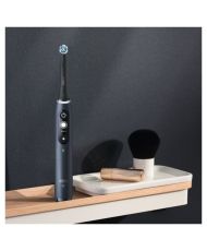 Schwarz-weiße elektrische Zahnbürsten, 3 Bürstenköpfe, 1 Reiseetui