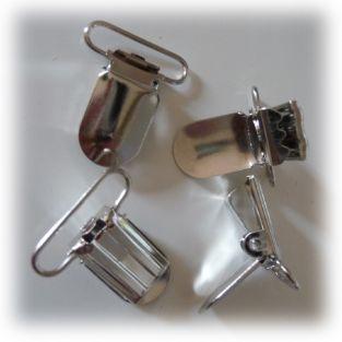  Attaches pour bretelles ou tétines 